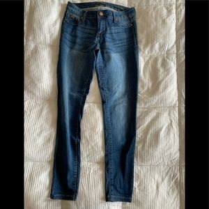 Mid-Rise ankle skinny jeans